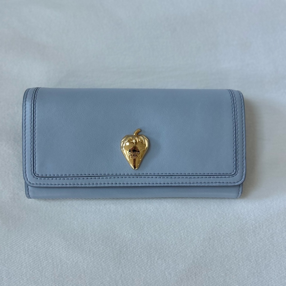 Brand new, never used. See by Chloe wallet. Blue/lavender color.